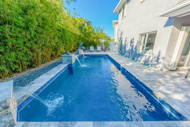 Family-oriented spacious house with grill, garden & private pool | Garden view | Pet-friendly in Fort Pierce, FL