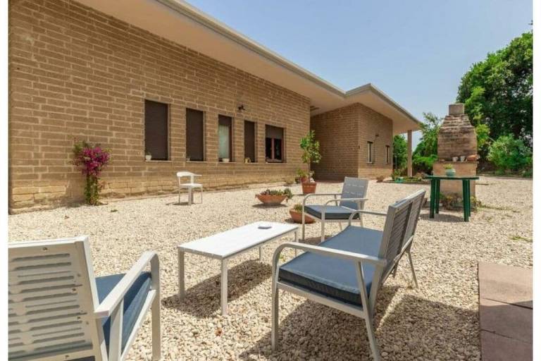 Villa with yard — photo 2