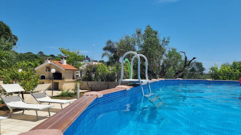 Rental apartment with patio, grill & garden | Pool view — photo 5