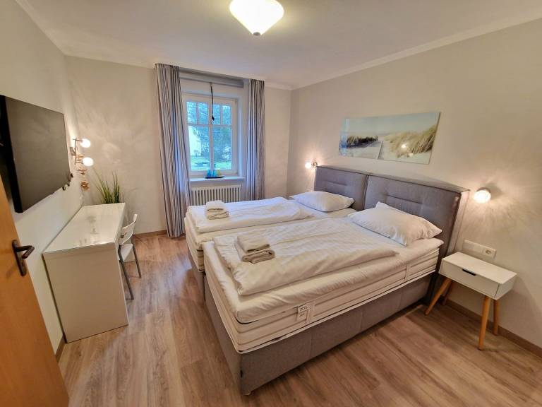 Komfortplus Ferienwohnung mit 1 Schlafzimmer und Balkon im Obergeschoss — photo 4