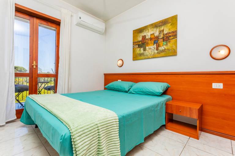 Child-friendly holiday apartment with barbecue, fast internet & yard | Garden view | Next to the beach | Dogs allowed — photo 4