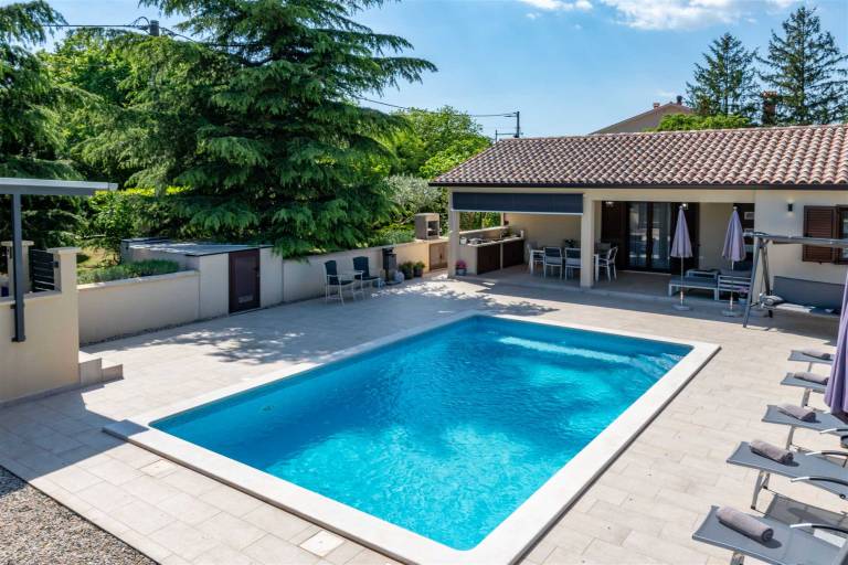 Rental with yard, terrace & BBQ | Pool view — photo 2