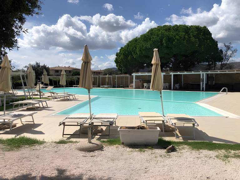 Apartment 'Trilocale Corallo 300 Mt Spiaggia' with Shared Pool, Private Terrace and Private Garden in Loiri Porto San Paolo