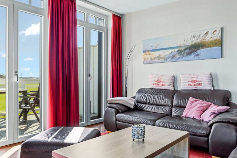 Dachgeschosswohnung in Strandnähe mit Sauna, zwei Balkonen und tollem Ausblick — photo 4