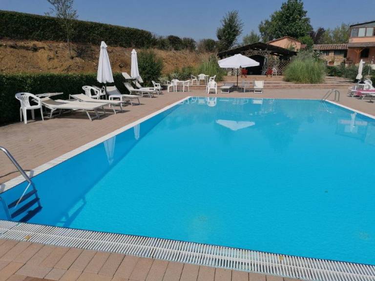 Family-friendly apartment with grill, patio & pool | Pool view | Dogs allowed — photo 5