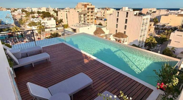 Nuevo estudio con rooftop y alberca cerca de la 5a Av y playa in Playa del Carmen