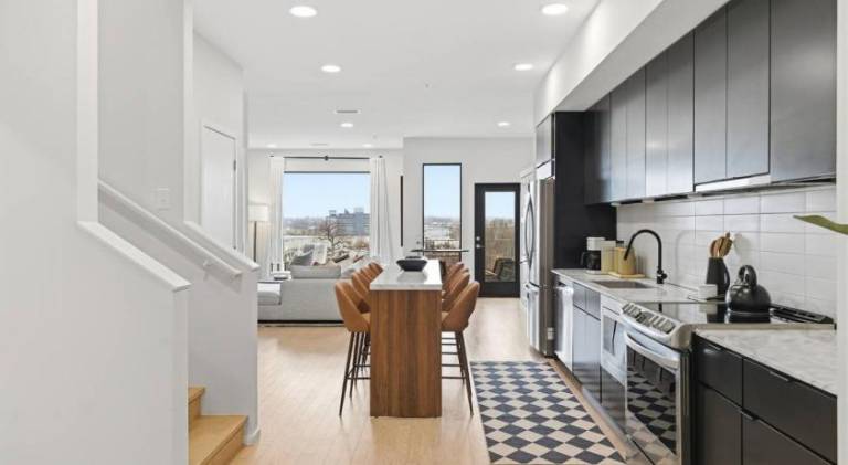 Penthouse River View Condo with Patio and Parking near Downtown — photo 2
