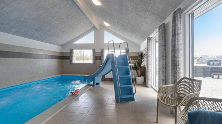 Vacation home with yard, sauna & private pool in Grenaa