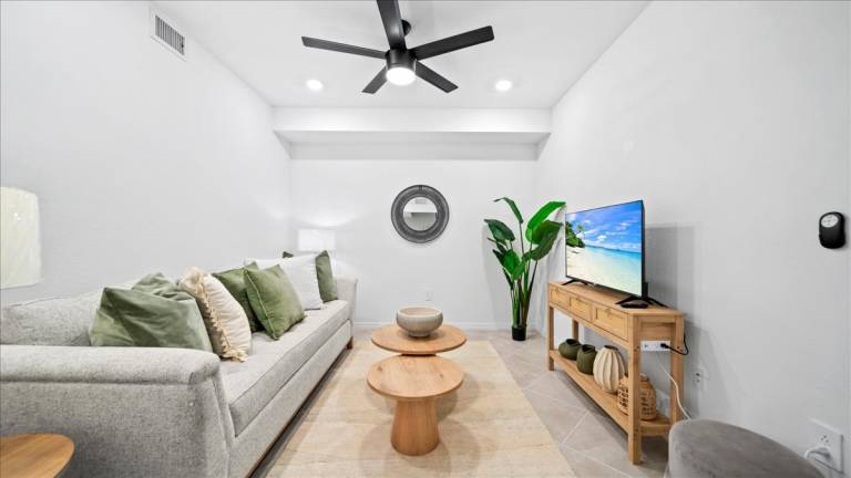 Condo with hot tub, yard & grill | Water view — photo 5