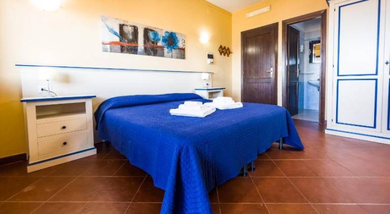 Serviced apartment with terrace & garden in Stintino