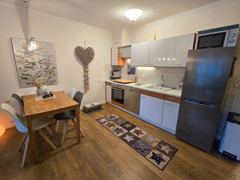 Komfortplus Ferienwohnung mit 1 Schlafzimmer und Balkon im Obergeschoss — photo 5