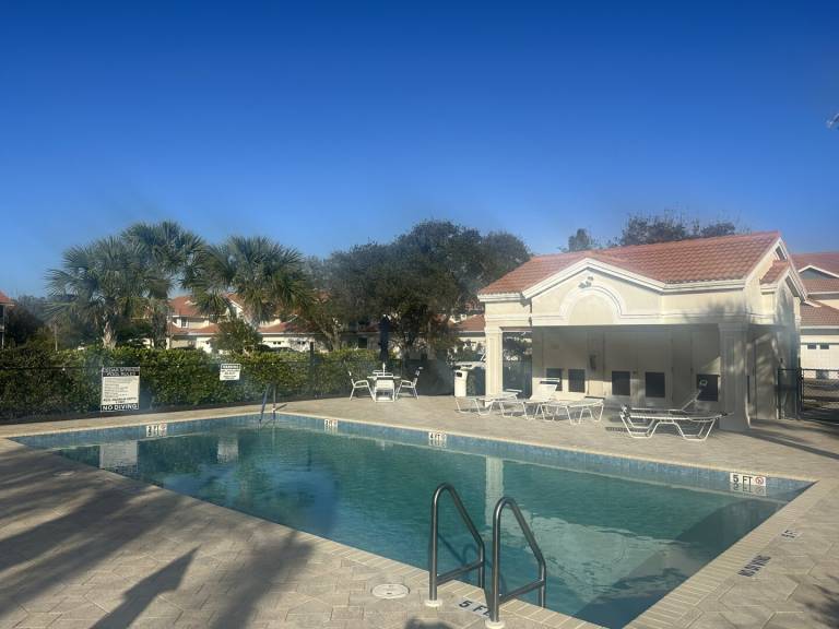 Condo with hot tub, garden & heated pool | Lake view in Bonita Springs, FL