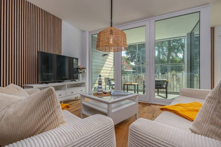 Modern eingerichtete Ferienwohnung an der Seebrücke in strandnaher Lage — photo 2