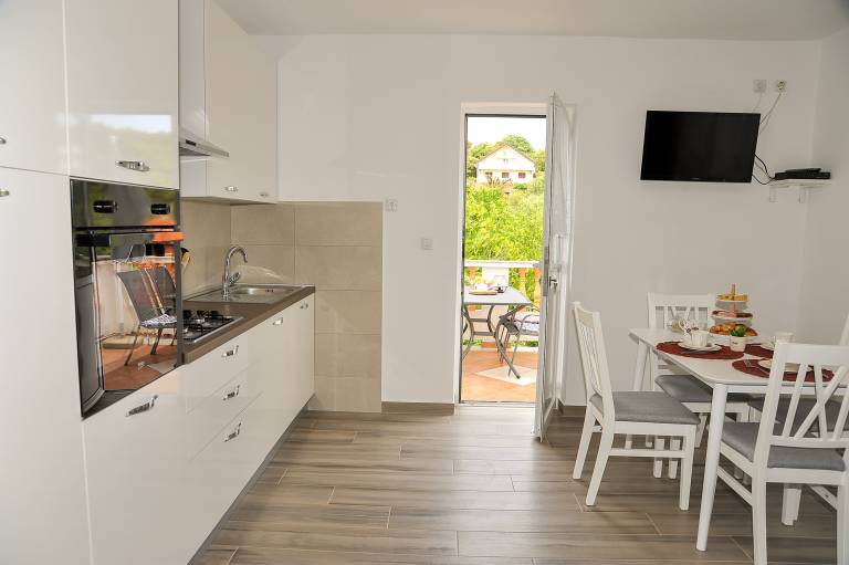 Two bedroom apartment with terrace and sea view Supetarska Draga - Gonar, Rab (A-24383-a) — photo 3