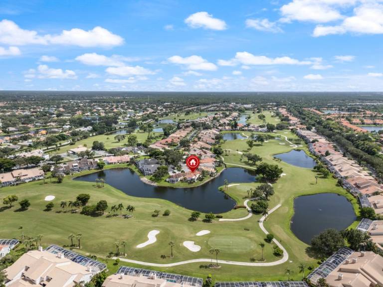 Stunning lakefront Golf Course Home in the heart of Naples. in Bonita Springs, FL