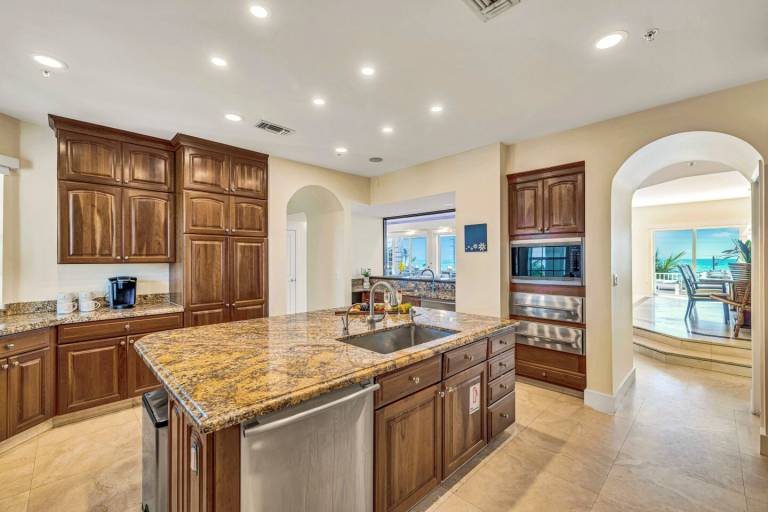 Ocean View Duplex Penthouse Retreat amenities: Tennis court, heated Pool — photo 3
