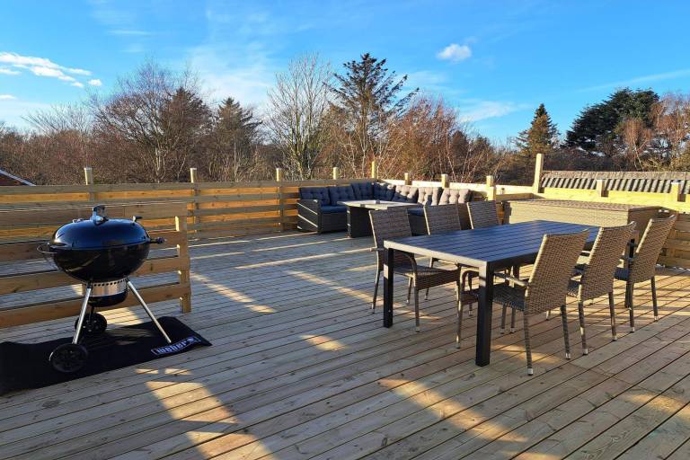 Vacation home with yard in Lokken
