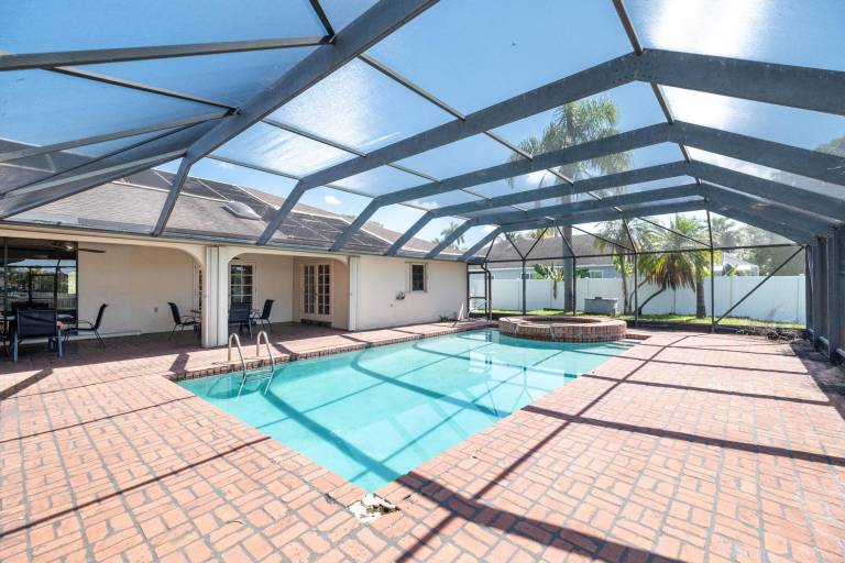Waterfront 5BR Home with Game room Pool Sleeps 10