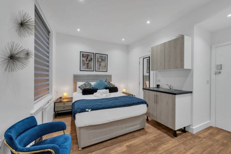 Compact Living Tiny Studio with Workspace