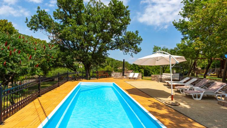 Pleasant villa with patio, yard & pool | Pets are welcome — photo 2