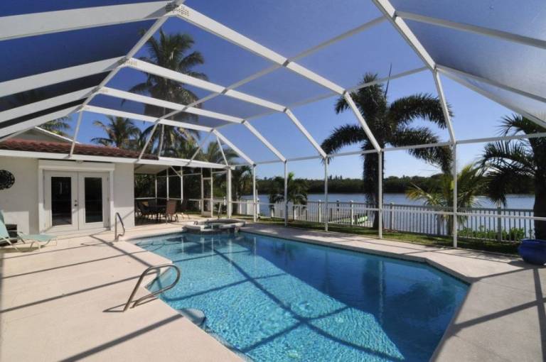 Banana River Beauty - Five Bedroom Waterfront Home with Heated Pool and Spa in Cape Canaveral, FL