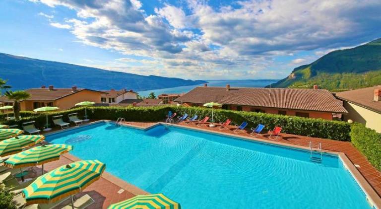 Serviced apartment with patio, yard & pool in Tignale