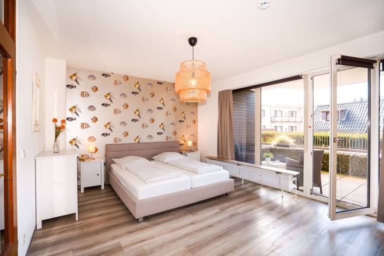 Modernes Appartement Sonnenkieker mit Balkon und Terrasse direkt am Deich in Groemitz