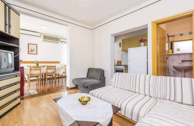 Two bedroom apartment with terrace and sea view Barbat, Rab (A-22498-b) — photo 4