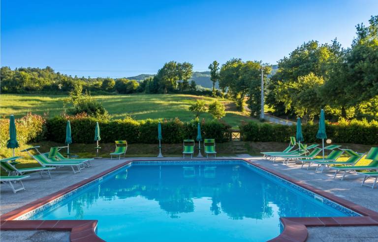 Ferienhaus mit Pool und Garten | Gartenblick