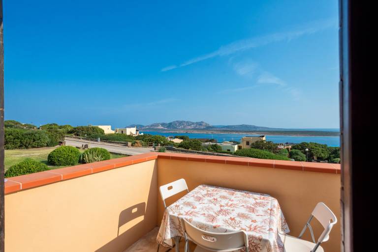 Holiday Home "Pergola 714" Steps from the Beach with Sea View and Balcony in Stintino