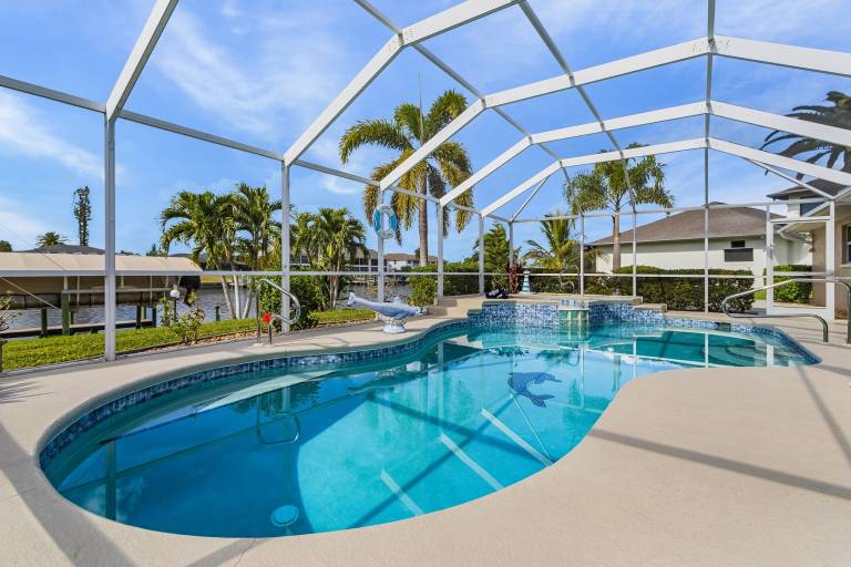 Waterfront Bliss with Pool, Spa & Gulf Access - Paradise on the Canal - Roelens in Cape Coral, FL
