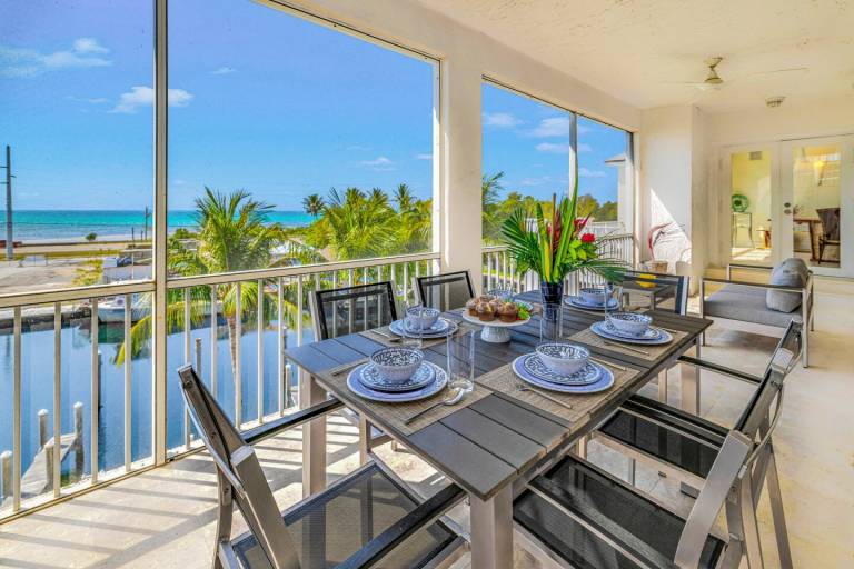 Ocean View Duplex Penthouse Retreat amenities: Tennis court, heated Pool — photo 2