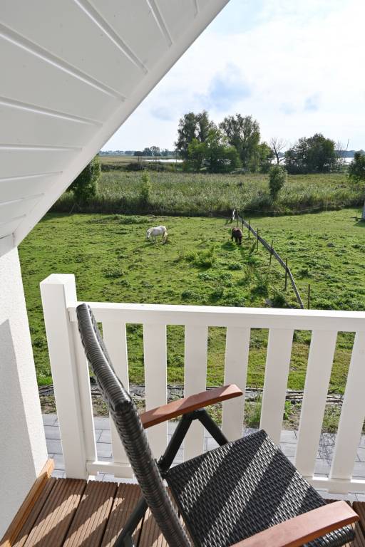 Holiday home with thatched roof, large property and private road to the port — photo 5