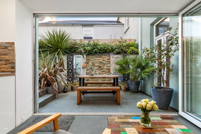 Family-oriented cottage with terrace & grill | Garden view | Next to the beach | Pets are welcome — photo 2