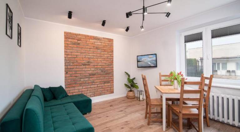 Holiday apartment with BBQ & garden in Wladyslawowo