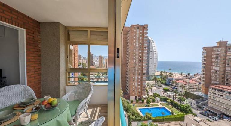 Holiday apartment with pool, yard & patio in Benidorm