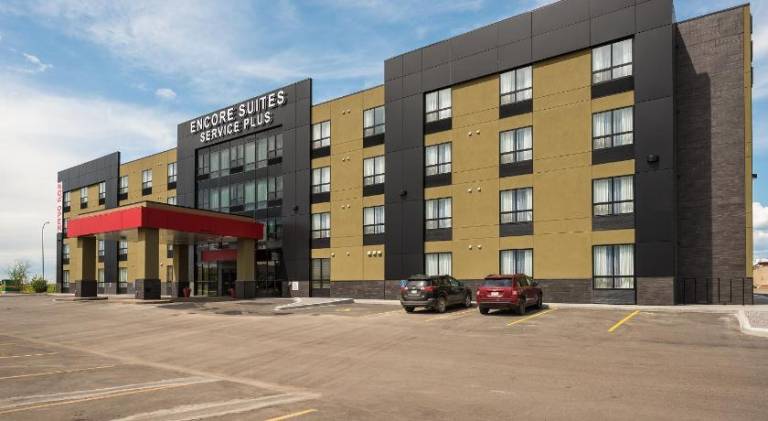 Encore Suites by Service Plus Inns — photo 3