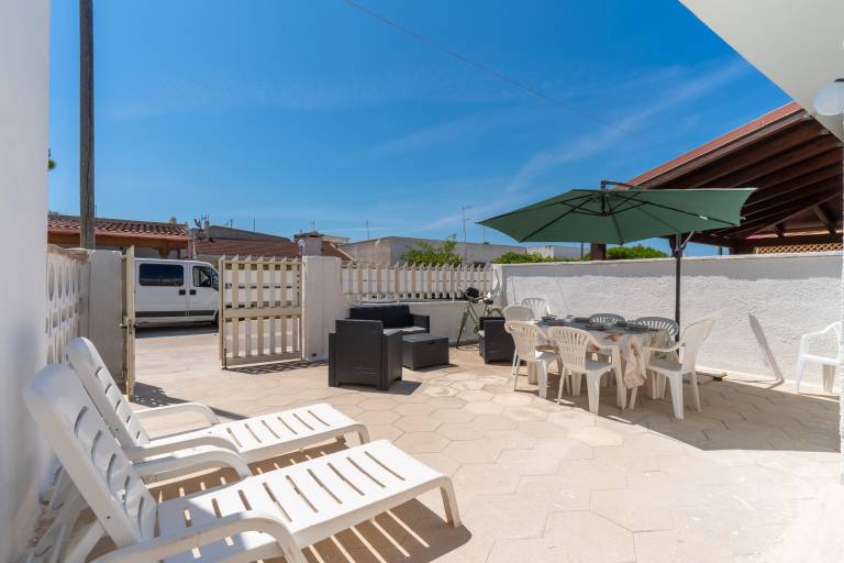 Holiday Home 'Villa Lido Hookipa' with Private Terrace and Air Conditioning in Porto Cesareo