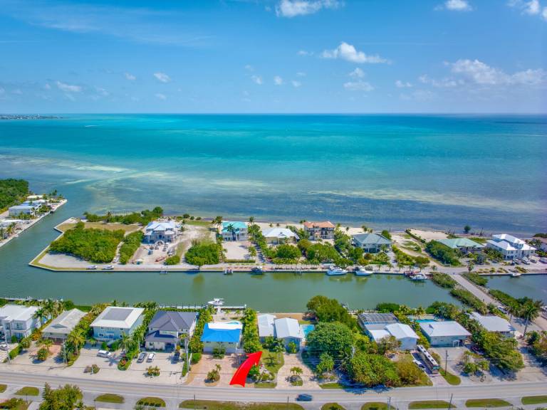 Easy Breezy Family Complex 5BR 3BTH 100ft Dock, Pool, & Beach! — photo 4