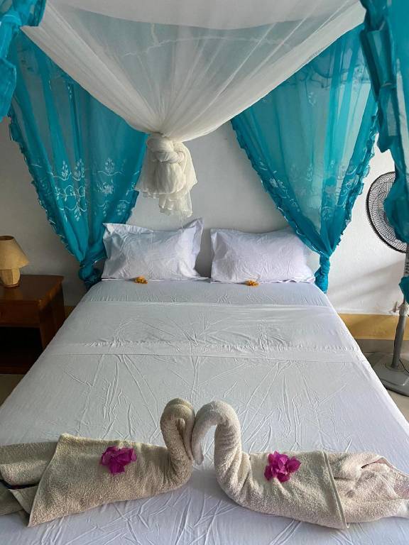 Family-oriented holiday apartment with yard, BBQ & patio | Close to the beach | Good for workation | Pets are welcome in Nosy Be