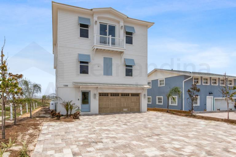 Experience oceanfront luxury at 1088 S. Fletcher Ave, a spacious 5-bedroom house — photo 3
