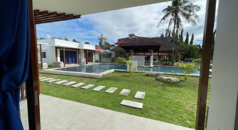 Bluewaves Hostel & Villa Panagsama by Hiverooms — photo 4