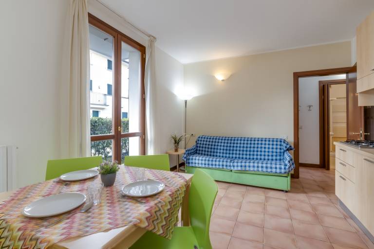 Rental apartment with yard & patio | Mountain view in Porlezza