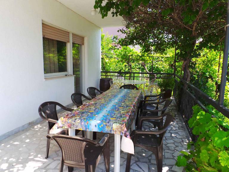 Holiday home with cosy terrace close to the beach in Medulin