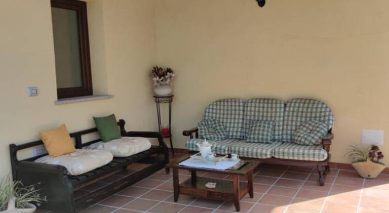 Holiday apartment with barbecue & garden in Oristano