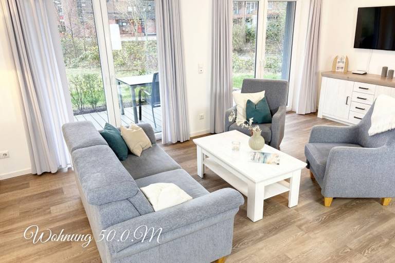 Moderne, hochwertige Ferienwohnung, Erdgeschoss, Sauna, Terrasse, strandnah in Wangerland