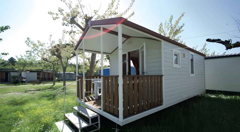 Mobile home with pool, terrace & yard — photo 2