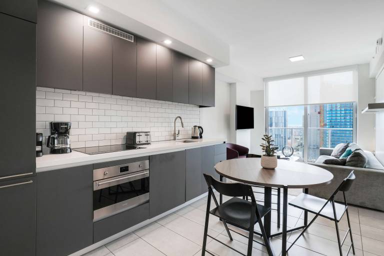 Luxury Condo Rooftop Pool & Gym