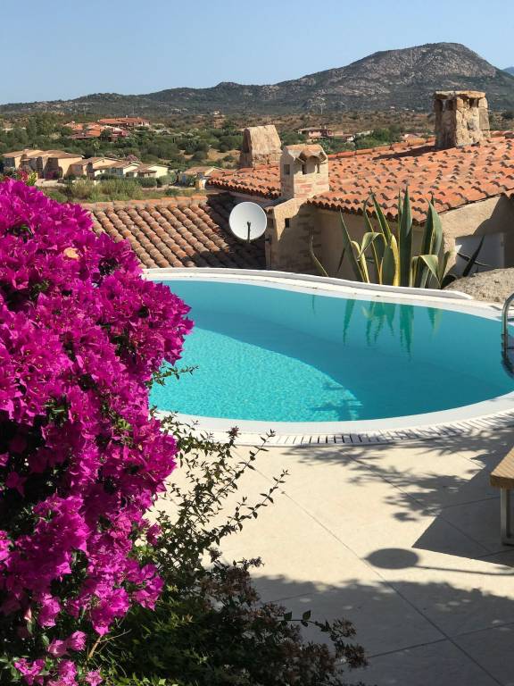 Villa with barbecue, private pool & patio | Sea view in Loiri Porto San Paolo