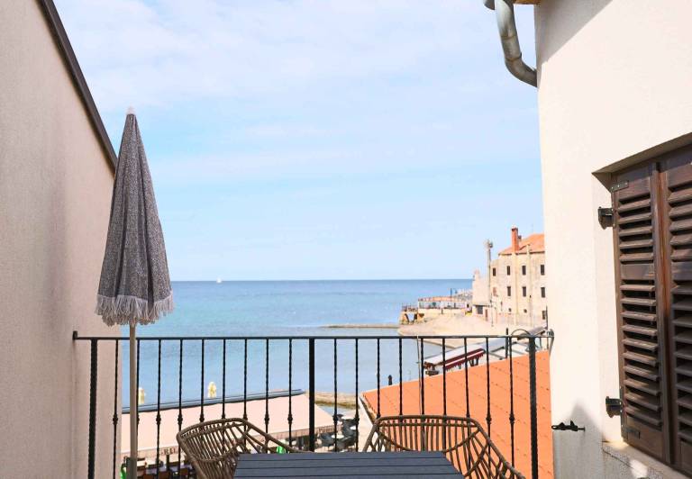 Holiday apartment with air conditioning only 50m from the beach — photo 4